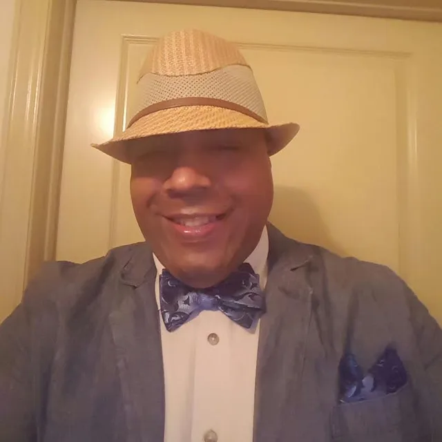 Dr. David T. Randolph wearing a fedora