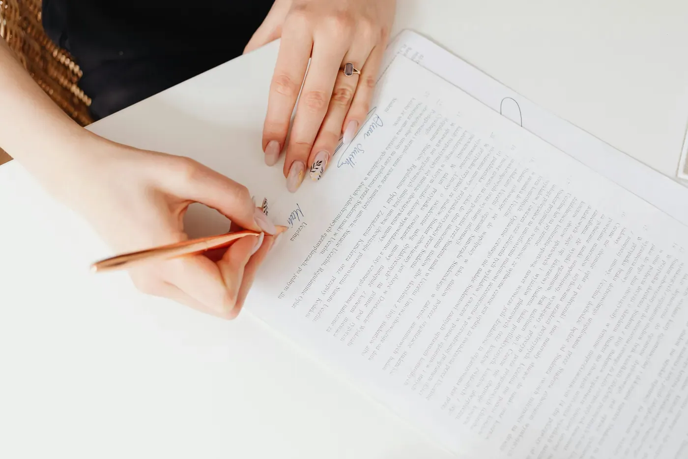 Woman signing notarial document